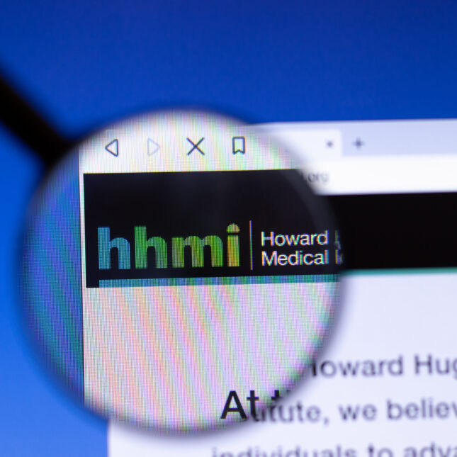 Howard Hughes Medical Institute HHMI website homepage with a magnifying glass hovering over. -- coverage from STAT