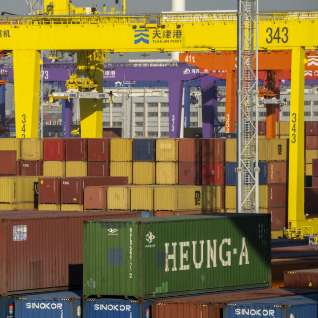 Colorful hipping containers are stacked at a port in Tianjin, China. -- health business coverage from STAT