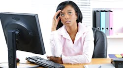 Woman Stressed At Desk 632cb75ce3200